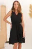 Cia Linen Mini Dress - Sleeveless Crochet Lattice Detail Pull Tie Waist Dress in Black sold by Salty Crush
