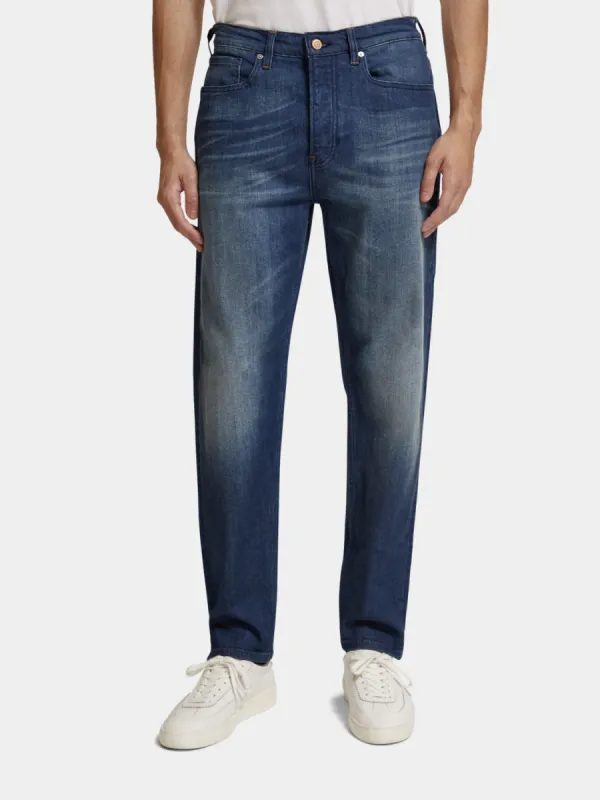 Drop tapered jeans sold by Scotch and Soda