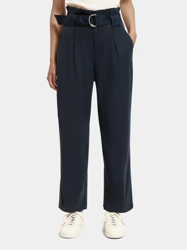 Daisy paper bag pants sold by Scotch and Soda