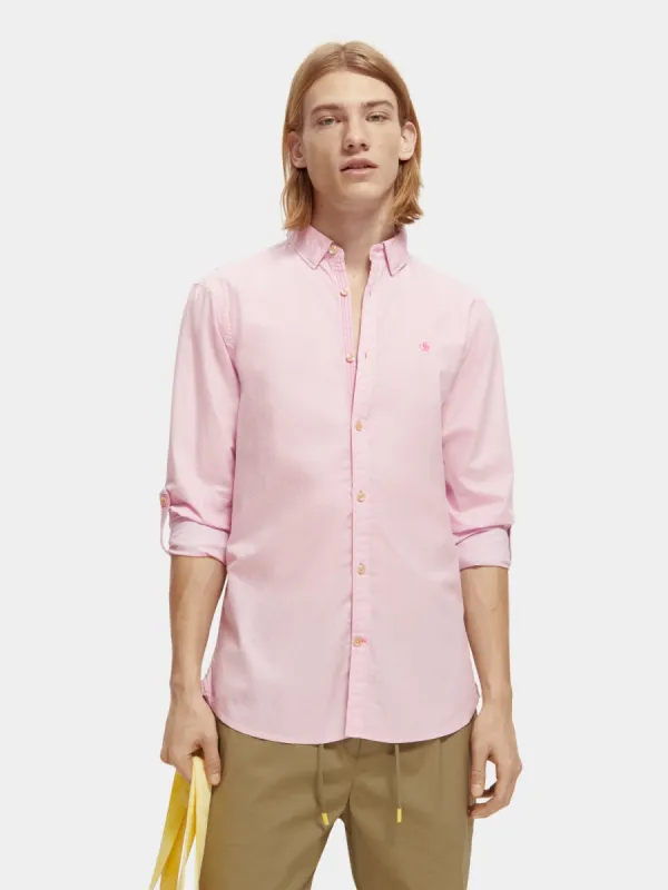 Worked-out poplin shirt in solids and stripes sold by Scotch and Soda