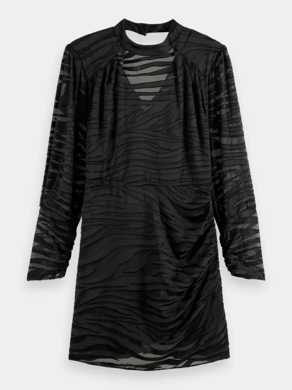 Mock neck mini dress sold by Scotch and Soda