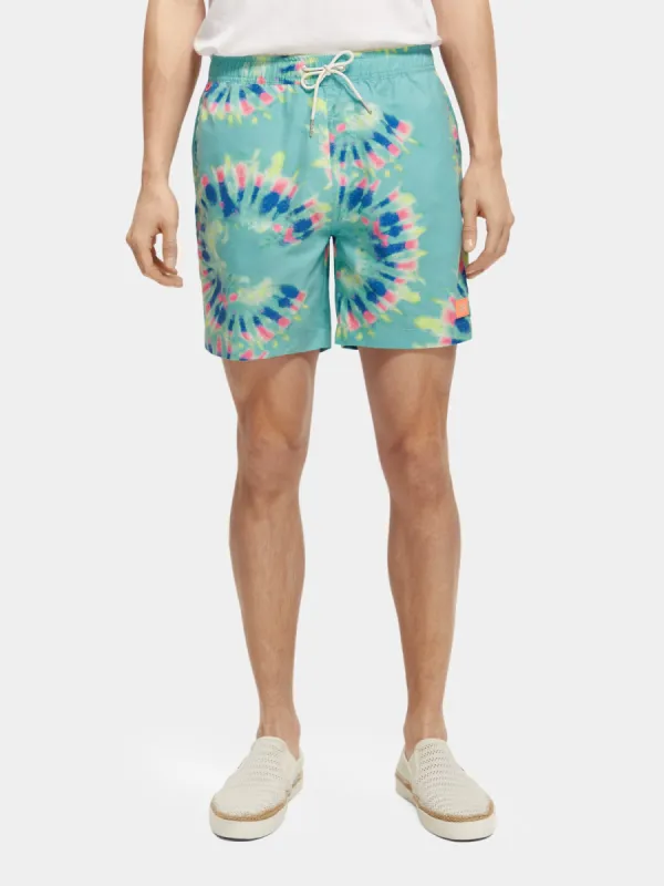 Mid-length tie-dyed printed swimshorts sold by Scotch and Soda