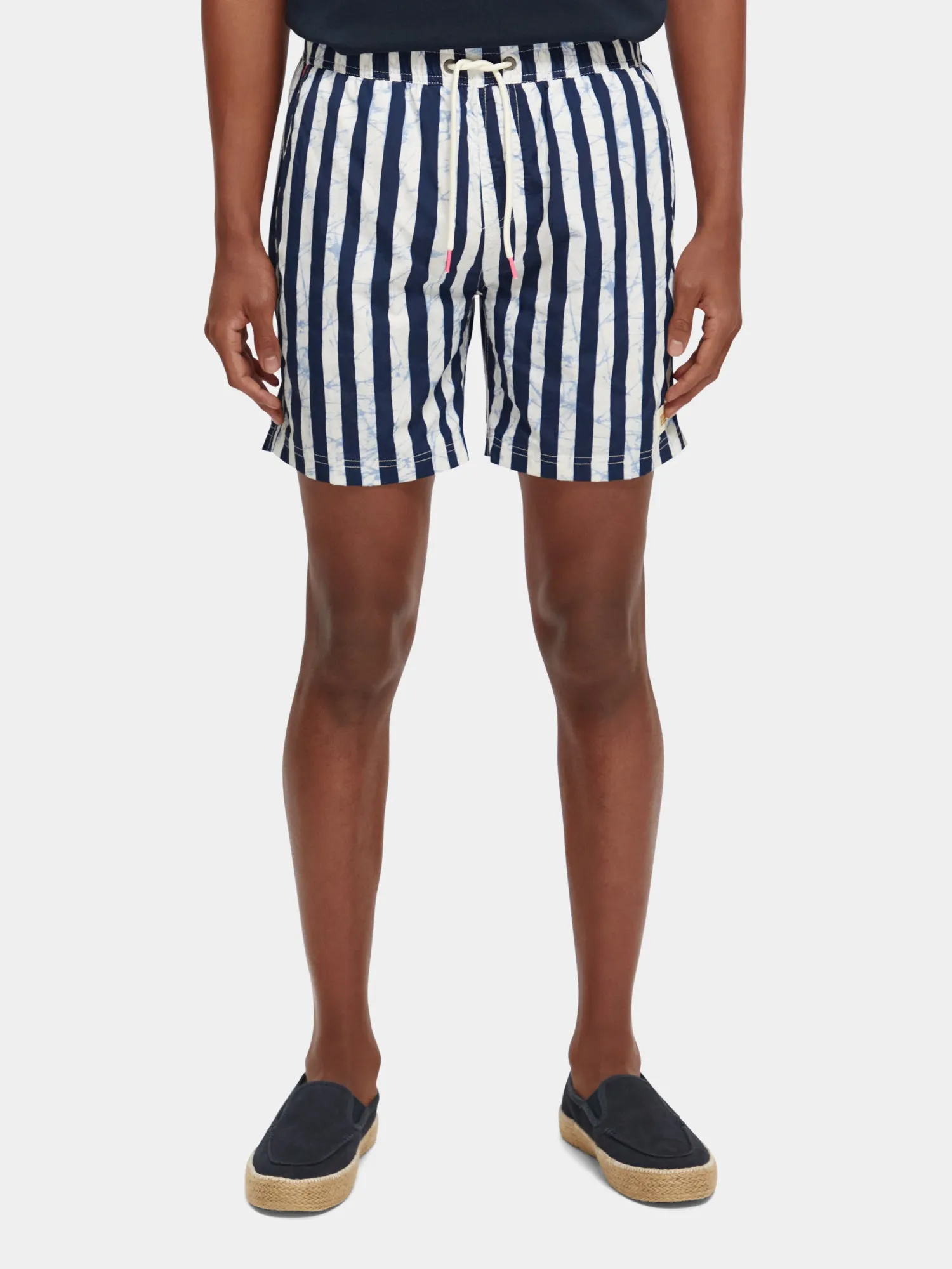 Mid-length Batik stripe printed swimshorts sold by Scotch and Soda