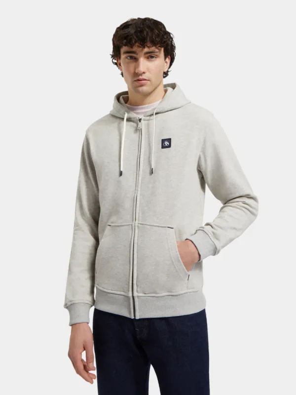 Zip-through hoodie sold by Scotch and Soda