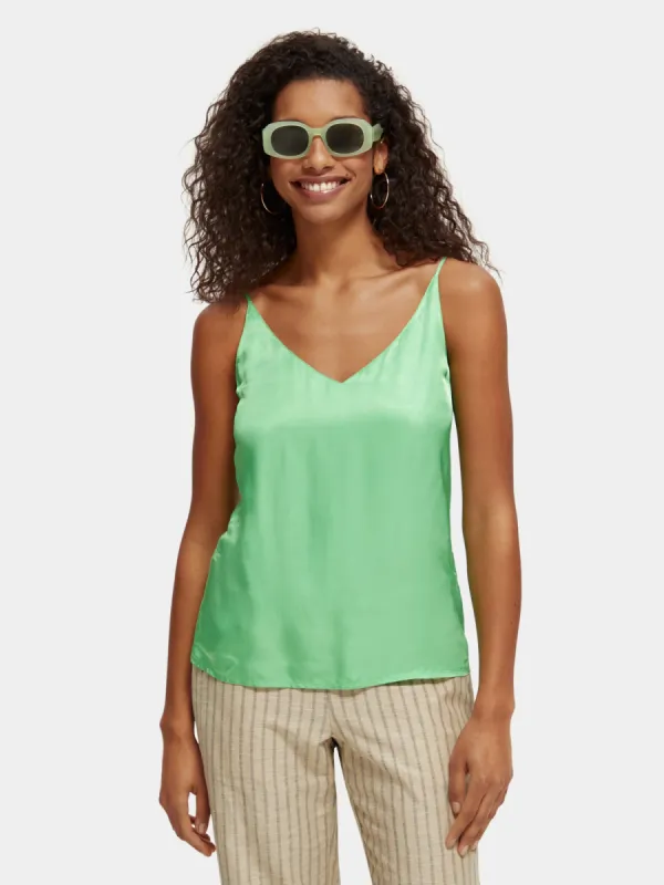 Jersey tank with woven front sold by Scotch and Soda