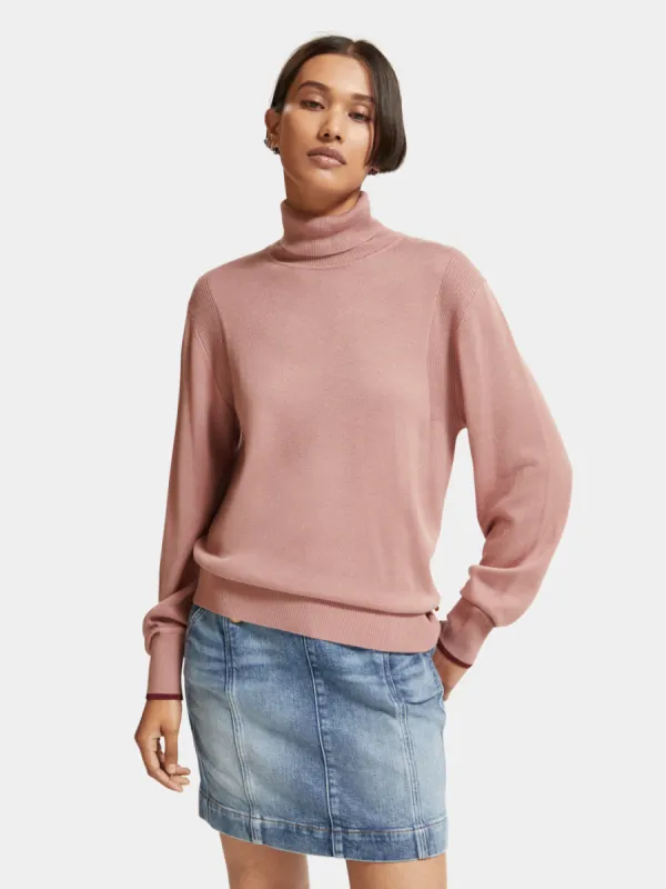 Roll neck pullover sold by Scotch and Soda