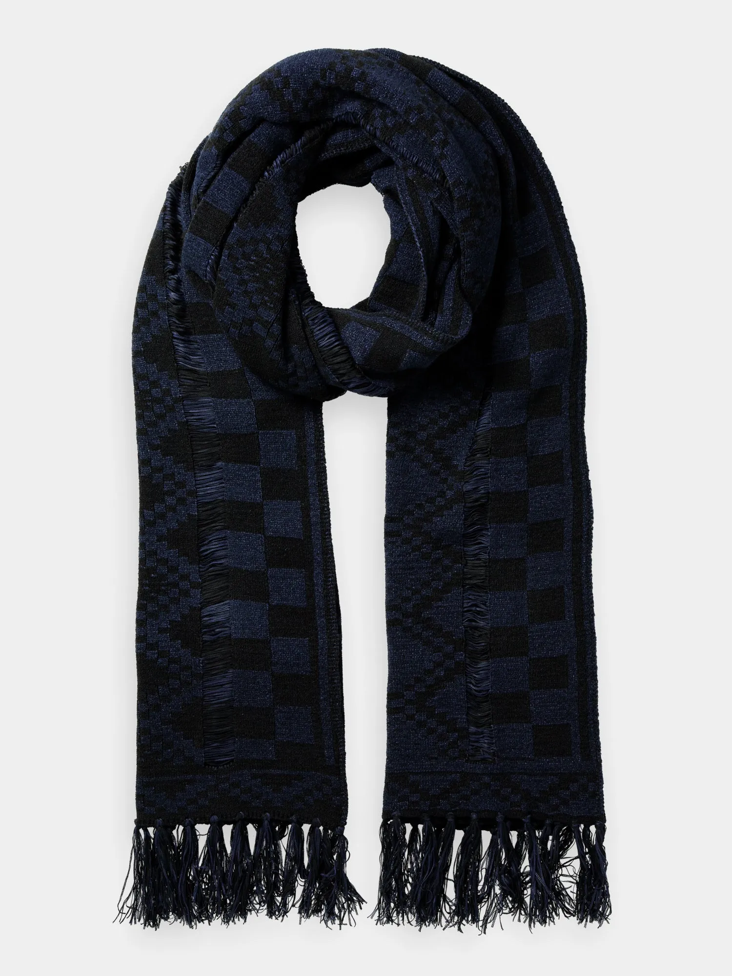 Fringed knitted scarf sold by Scotch and Soda