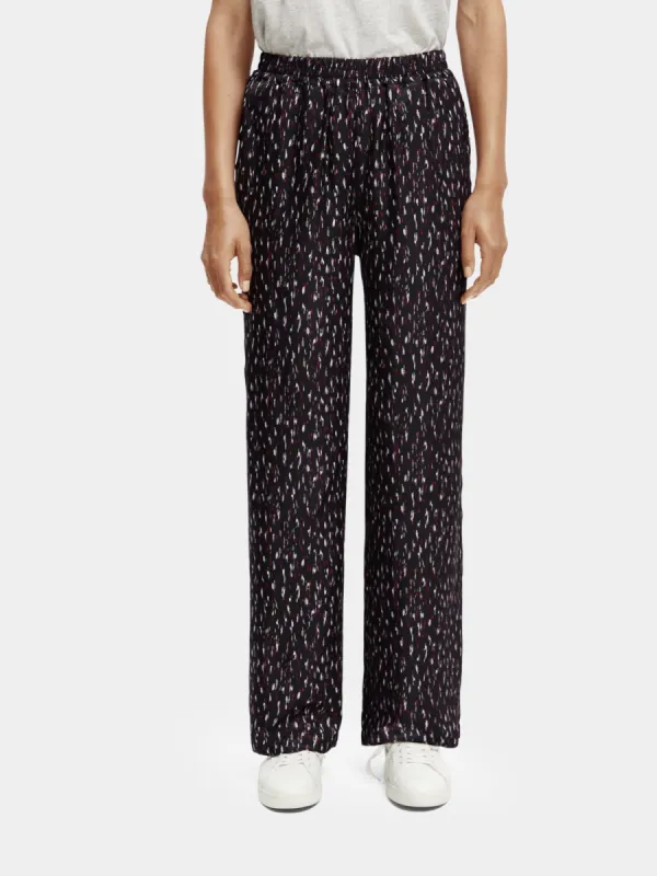 Gia mid-rise wide-leg printed elasticated pants sold by Scotch and Soda