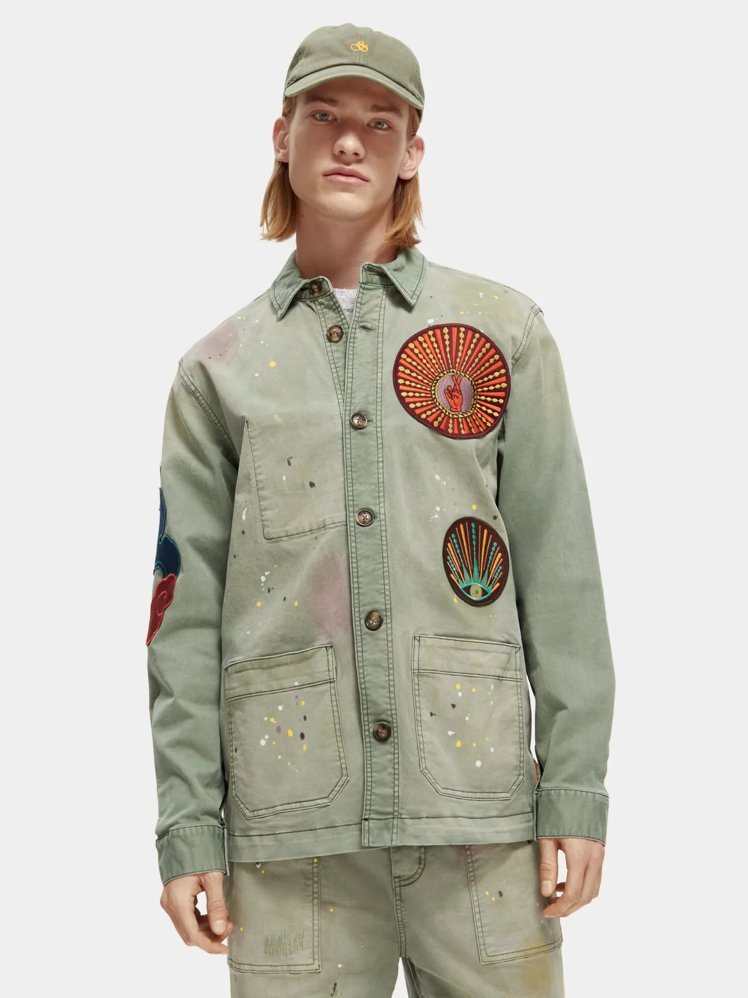 Worker jacket with special washing and badges sold by Scotch and Soda