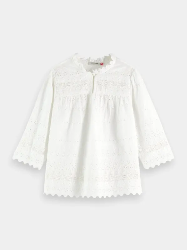 Broderie anglaise blouse sold by Scotch and Soda
