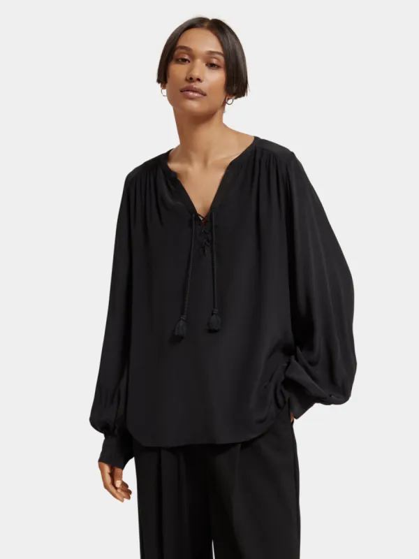 Lace-up blouse sold by Scotch and Soda