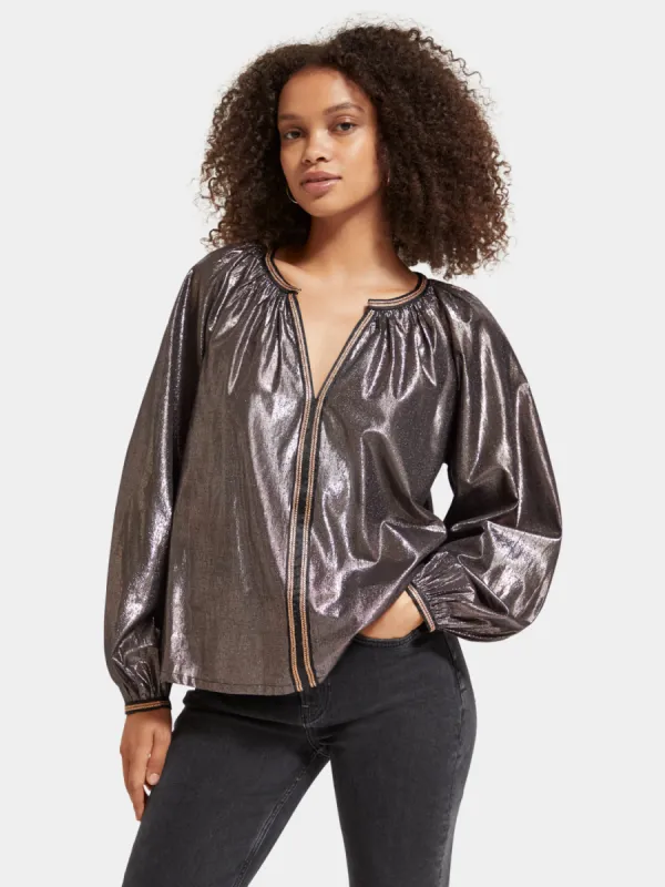 Shiny balloon sleeve blouse sold by Scotch and Soda