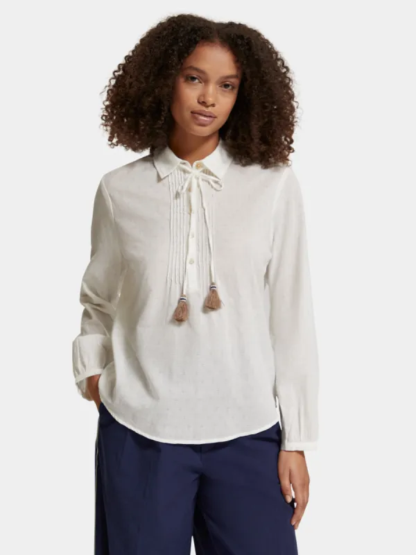 Pintuck tassel blouse sold by Scotch and Soda