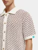 Button-down knitted polo sold by Scotch and Soda