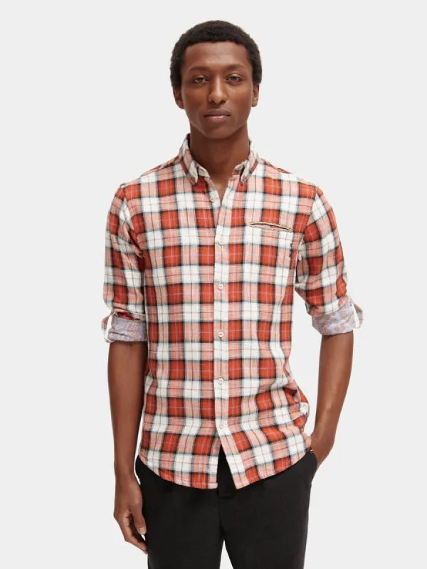 Checked flannel shirt with sleeve adjustments sold by Scotch and Soda