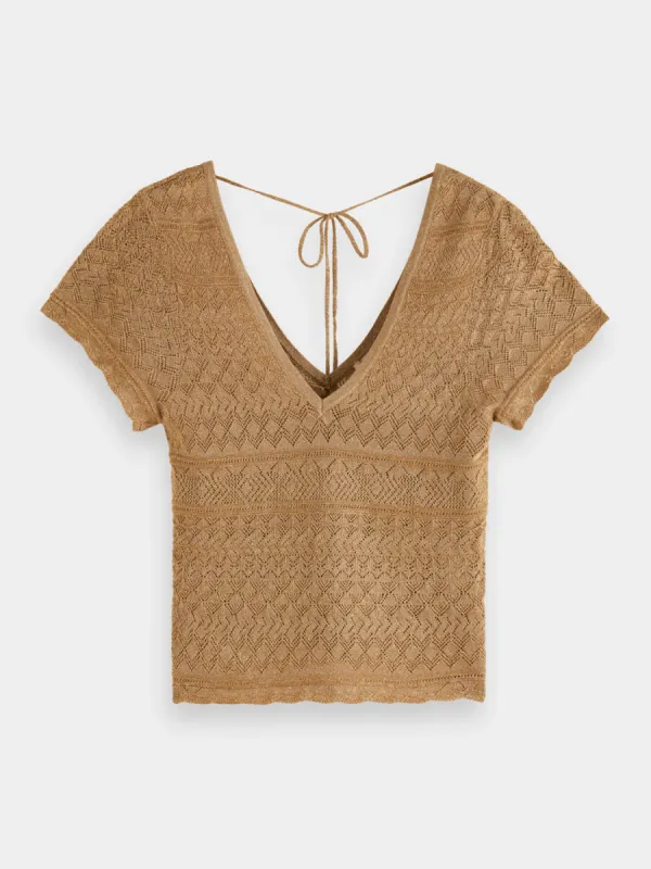 Metallic pointelle v-neck top sold by Scotch and Soda