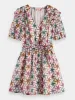 Ruffled mini dress sold by Scotch and Soda
