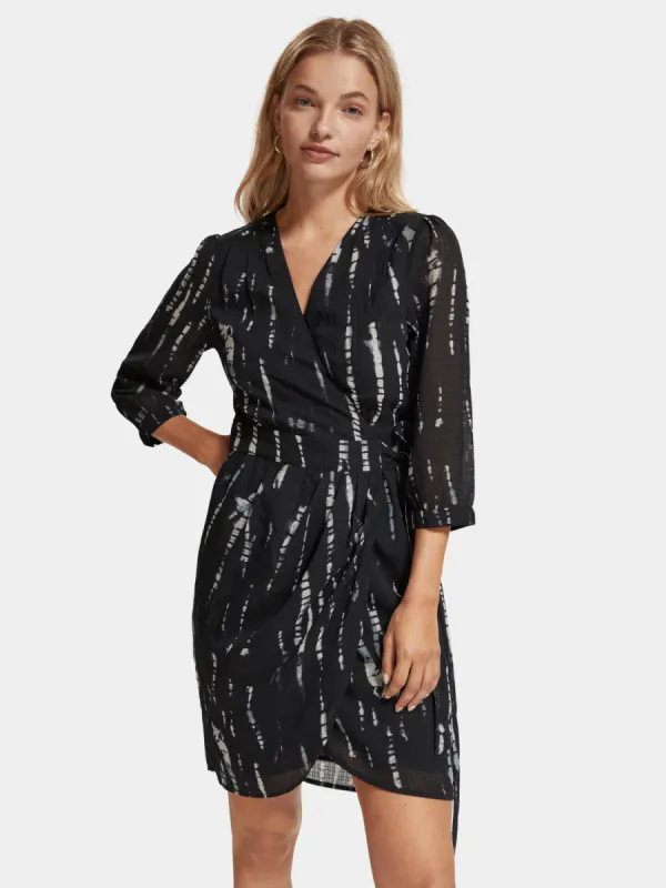Printed mini wrap dress sold by Scotch and Soda
