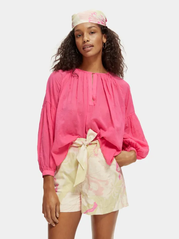 Voluminous popover top with allover embroidery sold by Scotch and Soda