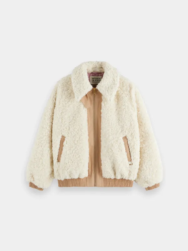 Teddy bomber jacket sold by Scotch and Soda