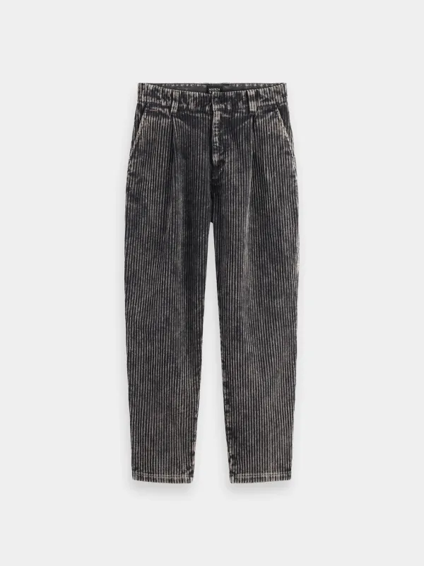 Washed corduroy pleated chinos sold by Scotch and Soda