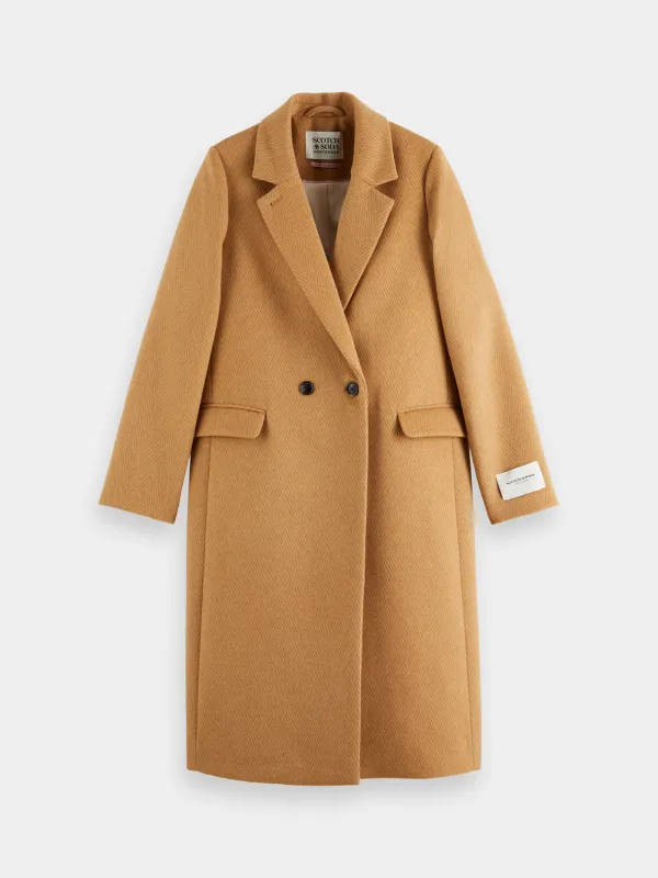 Herringbone tailored coat sold by Scotch and Soda