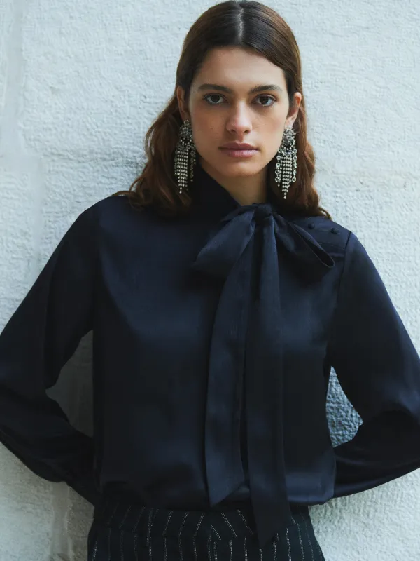 Bow neck top sold by Scotch and Soda