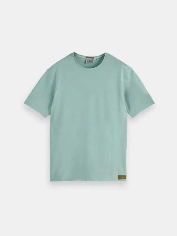 Raw edge garment-dyed t-shirt sold by Scotch and Soda