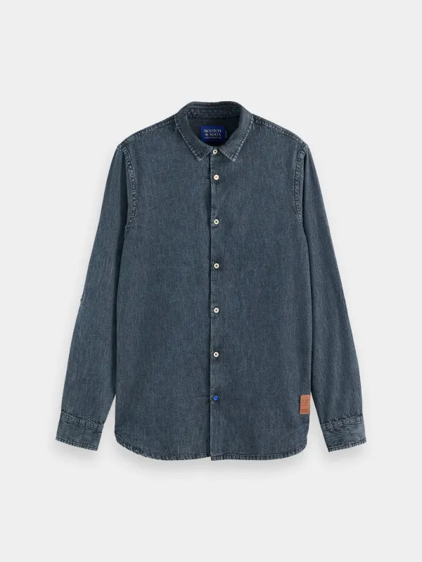 Washed black denim shirt sold by Scotch and Soda