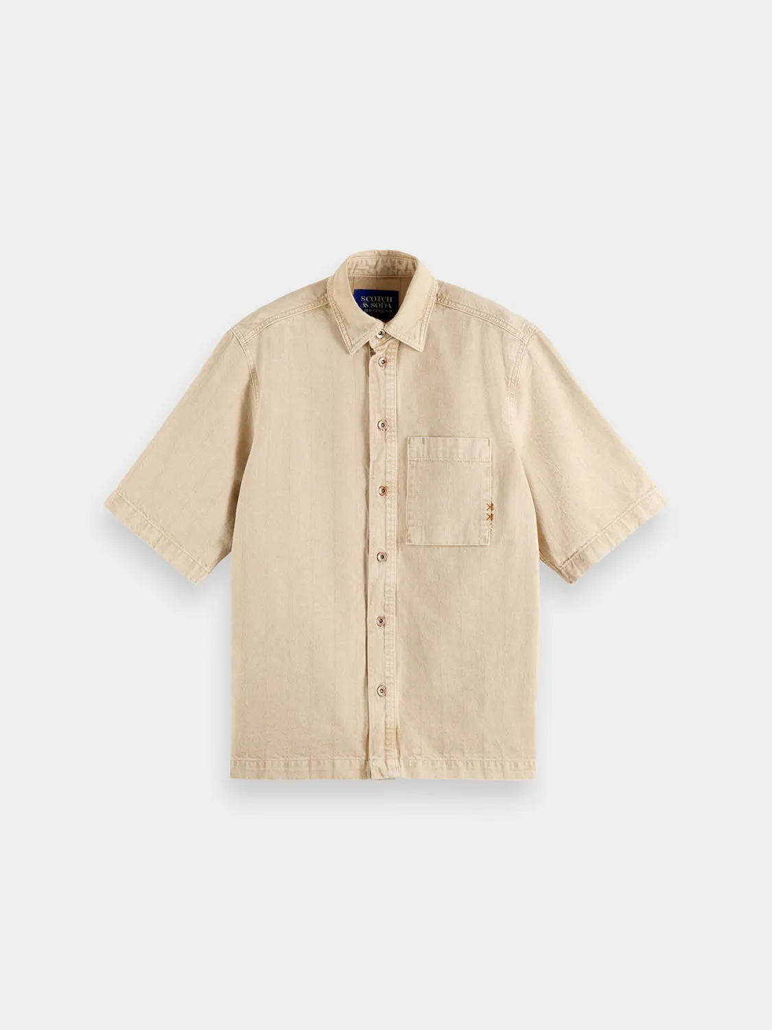 Washed denim shirt sold by Scotch and Soda