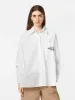 Embroidered poplin shirt sold by Scotch and Soda
