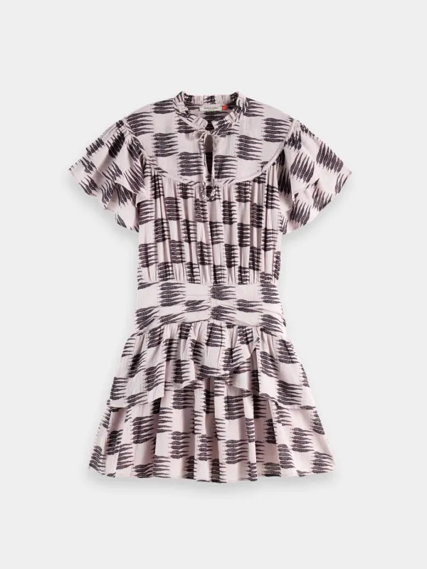 Ruffled mini dress sold by Scotch and Soda