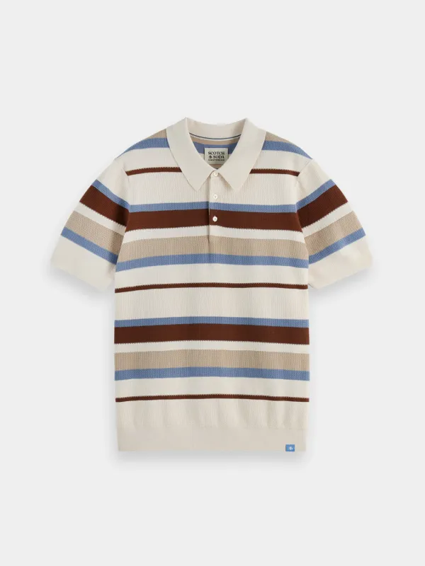Knitted striped polo sold by Scotch and Soda