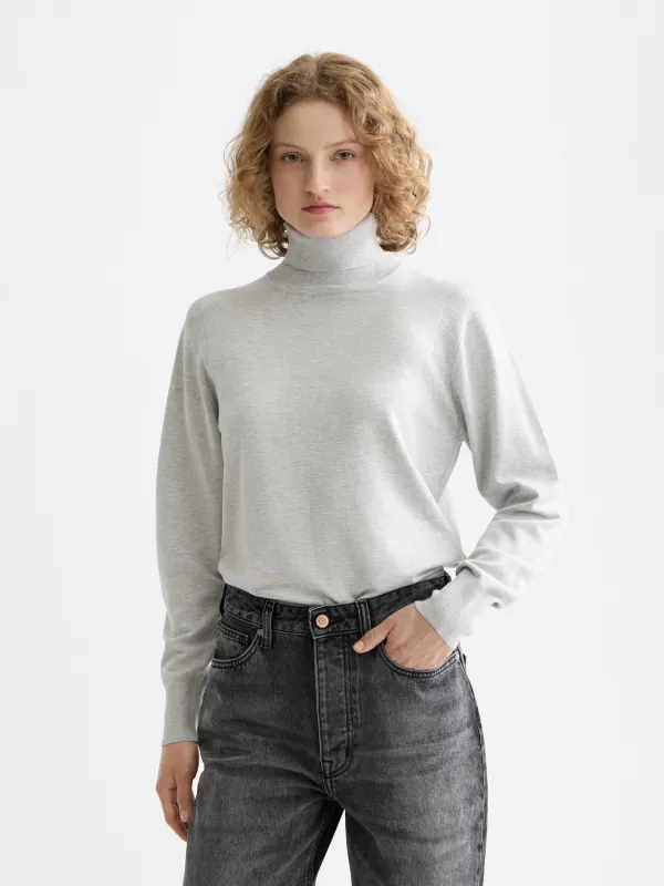 Roll neck relaxed pullover sold by Scotch & Soda