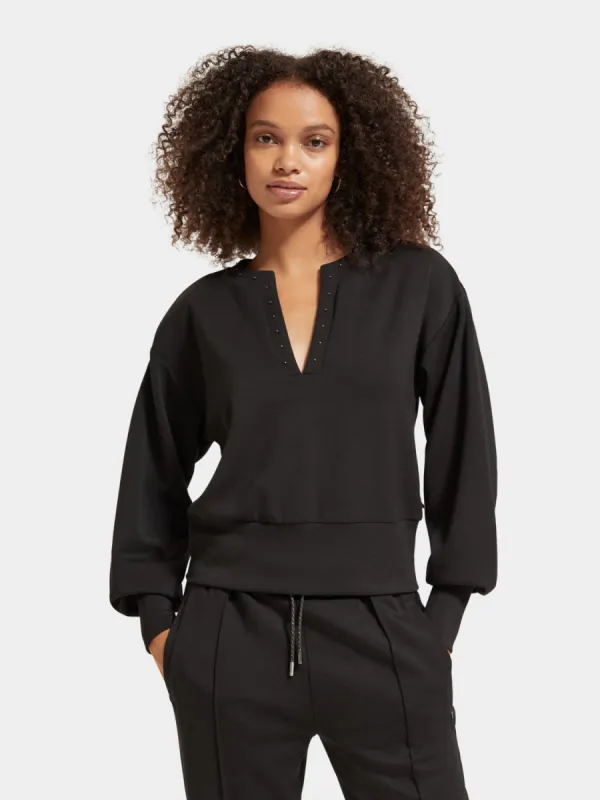 V-neck puff sleeved sweatshirt sold by Scotch & Soda