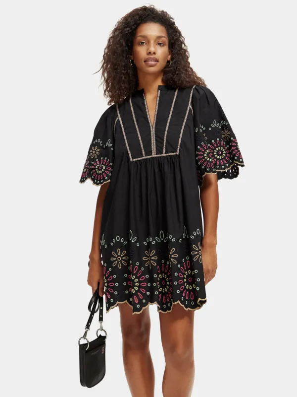 Broderie mini dress sold by Scotch and Soda