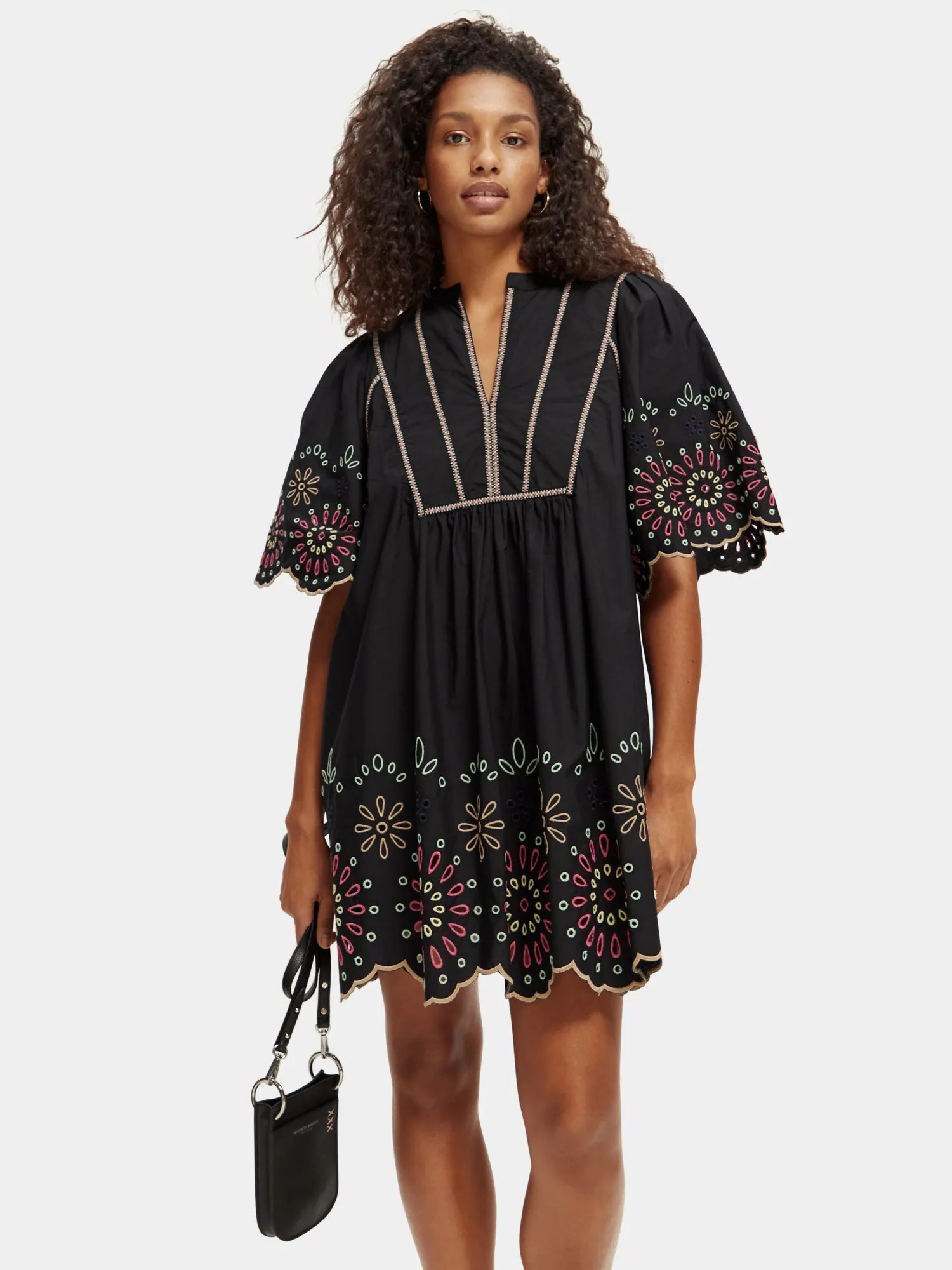 Broderie mini dress sold by Scotch and Soda