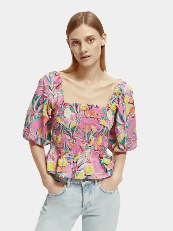 Smocked puff sleeve top sold by Scotch and Soda
