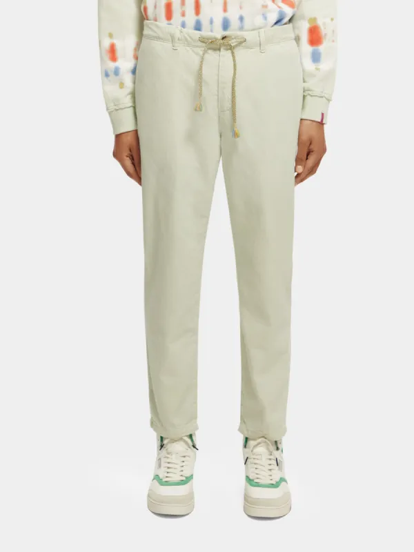 Drift garment-dyed cotton-linen jogger pants sold by Scotch and Soda