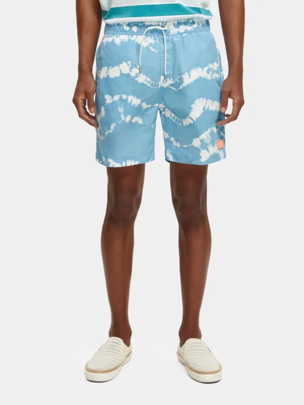 Mid-length tie-dyed printed swimshorts sold by Scotch and Soda