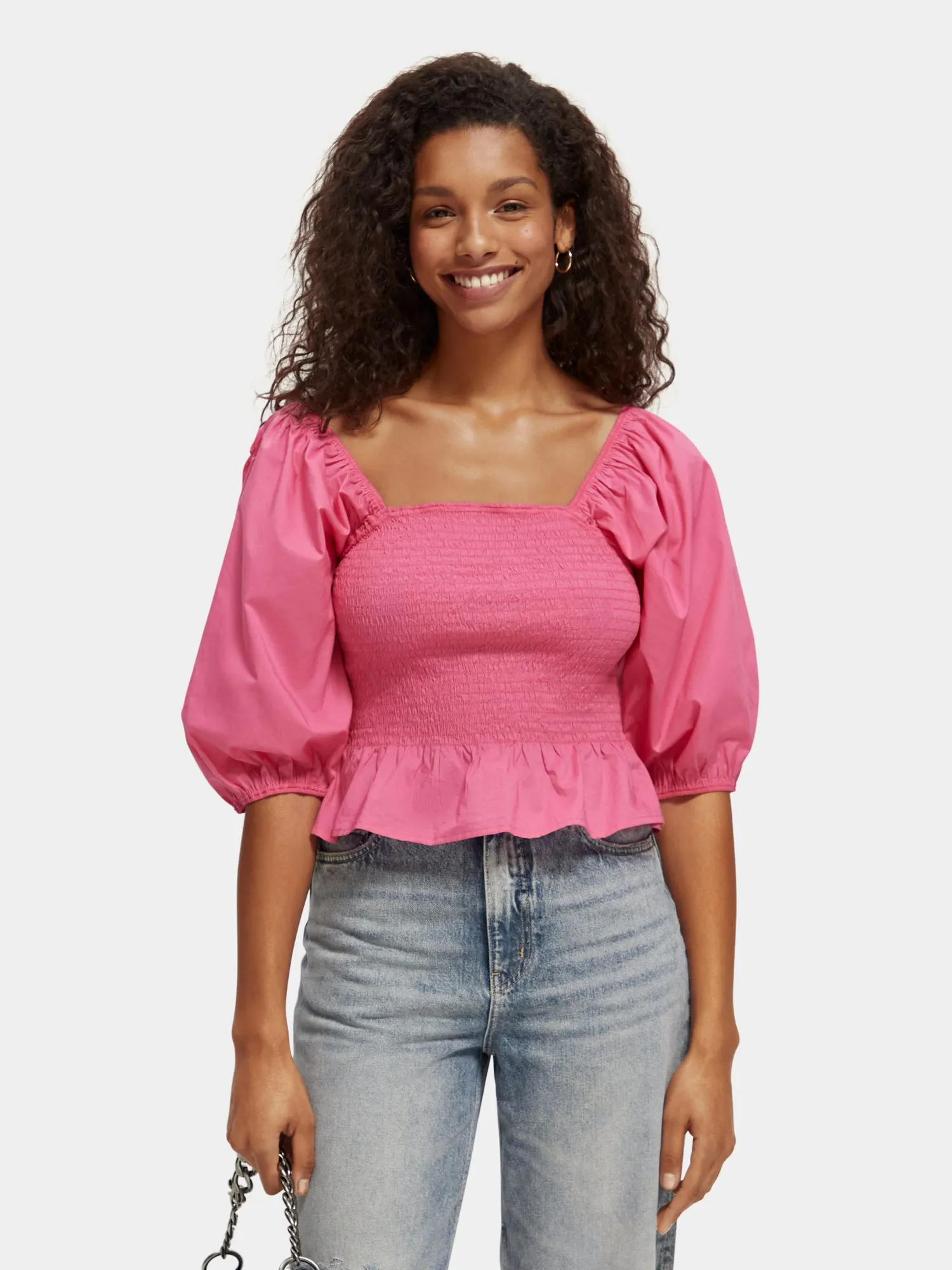 Smocked puff sleeve top sold by Scotch and Soda
