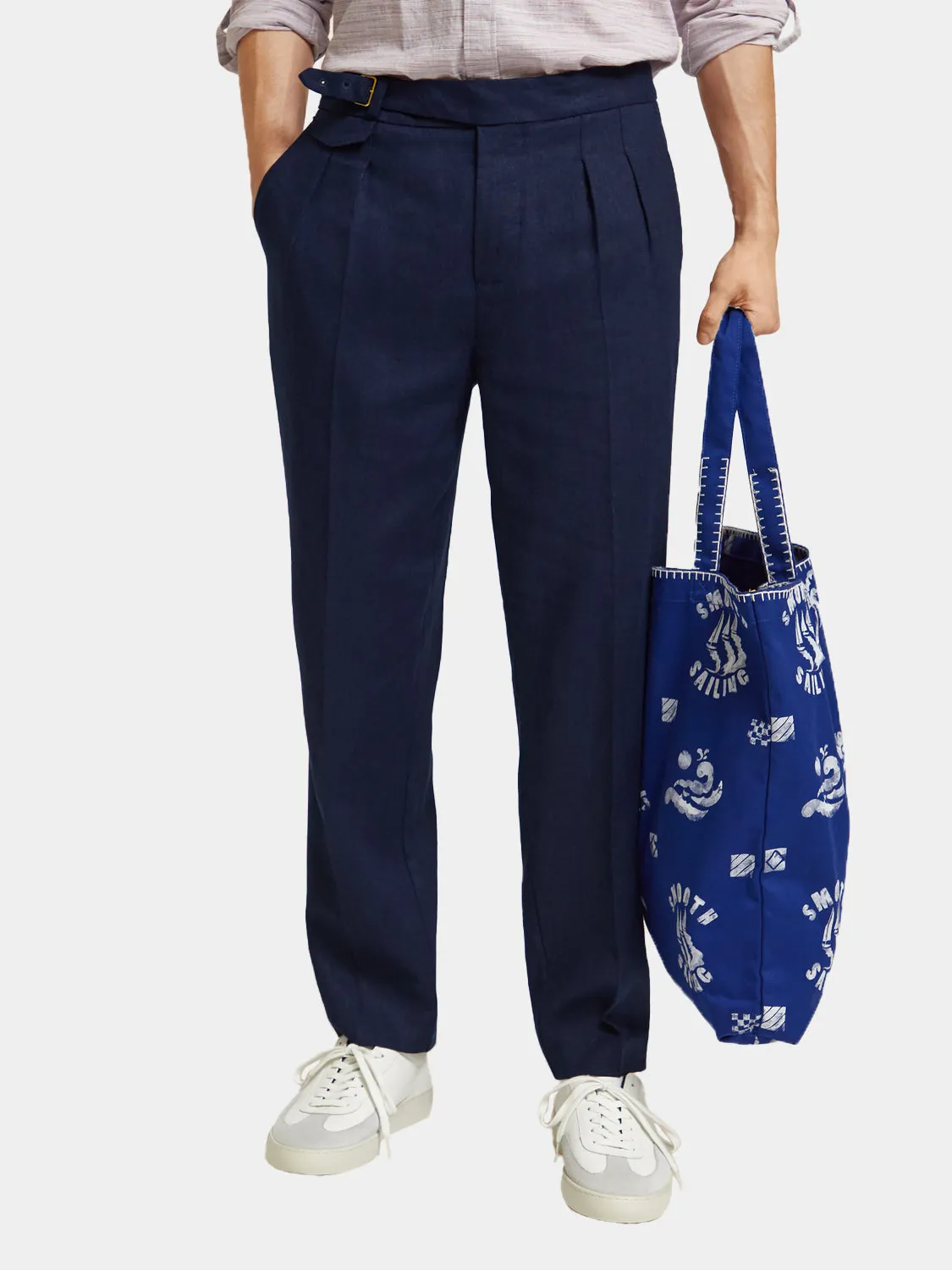 Pleated wide-fit herringbone chino sold by Scotch and Soda