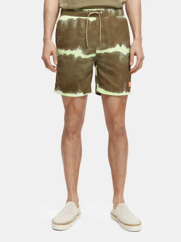 Mid-length tie-dyed printed swimshorts sold by Scotch and Soda