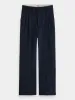 Loose tapered pinstripe pants sold by Scotch and Soda