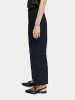 Loose tapered pinstripe pants sold by Scotch and Soda