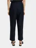 Loose tapered pinstripe pants sold by Scotch and Soda