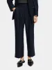 Loose tapered pinstripe pants sold by Scotch and Soda