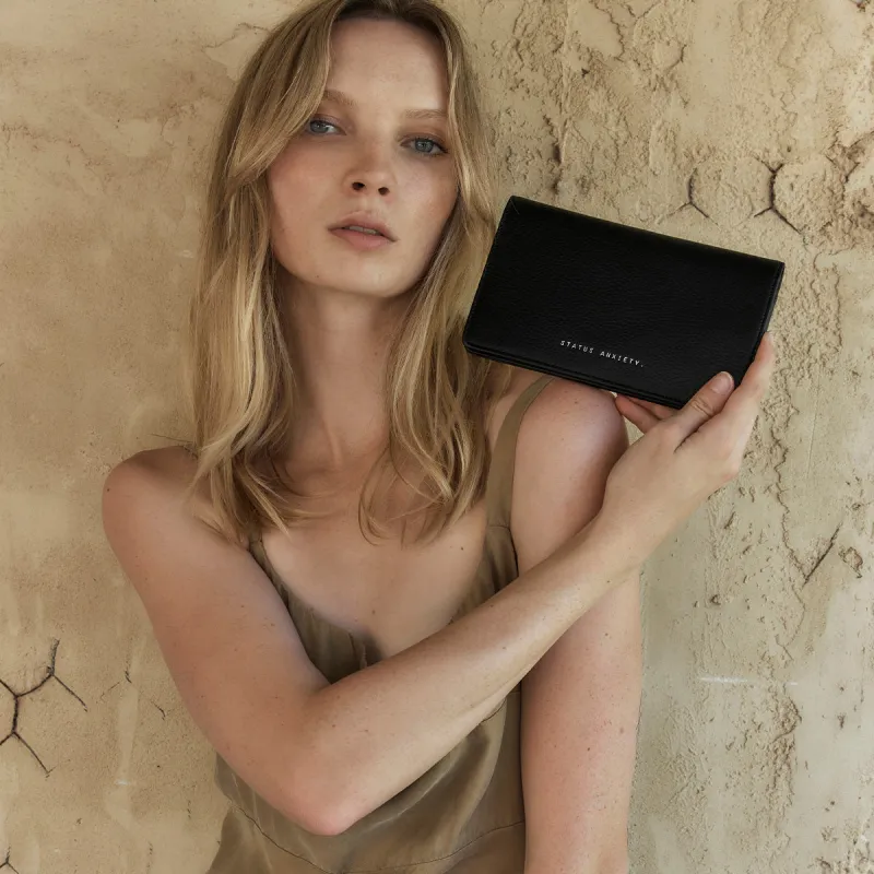 Status Anxiety Living Proof Black sold by Shine On