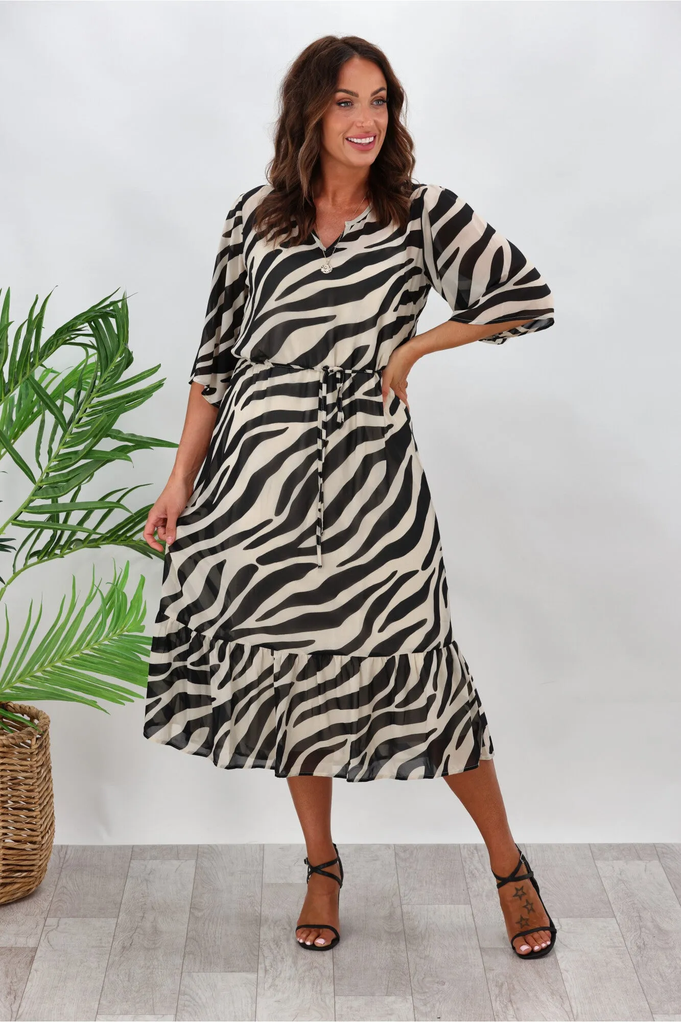 Gloss by Shine On Sorrento Flutter Sleeve Dress Zebra Print sold by Shine On