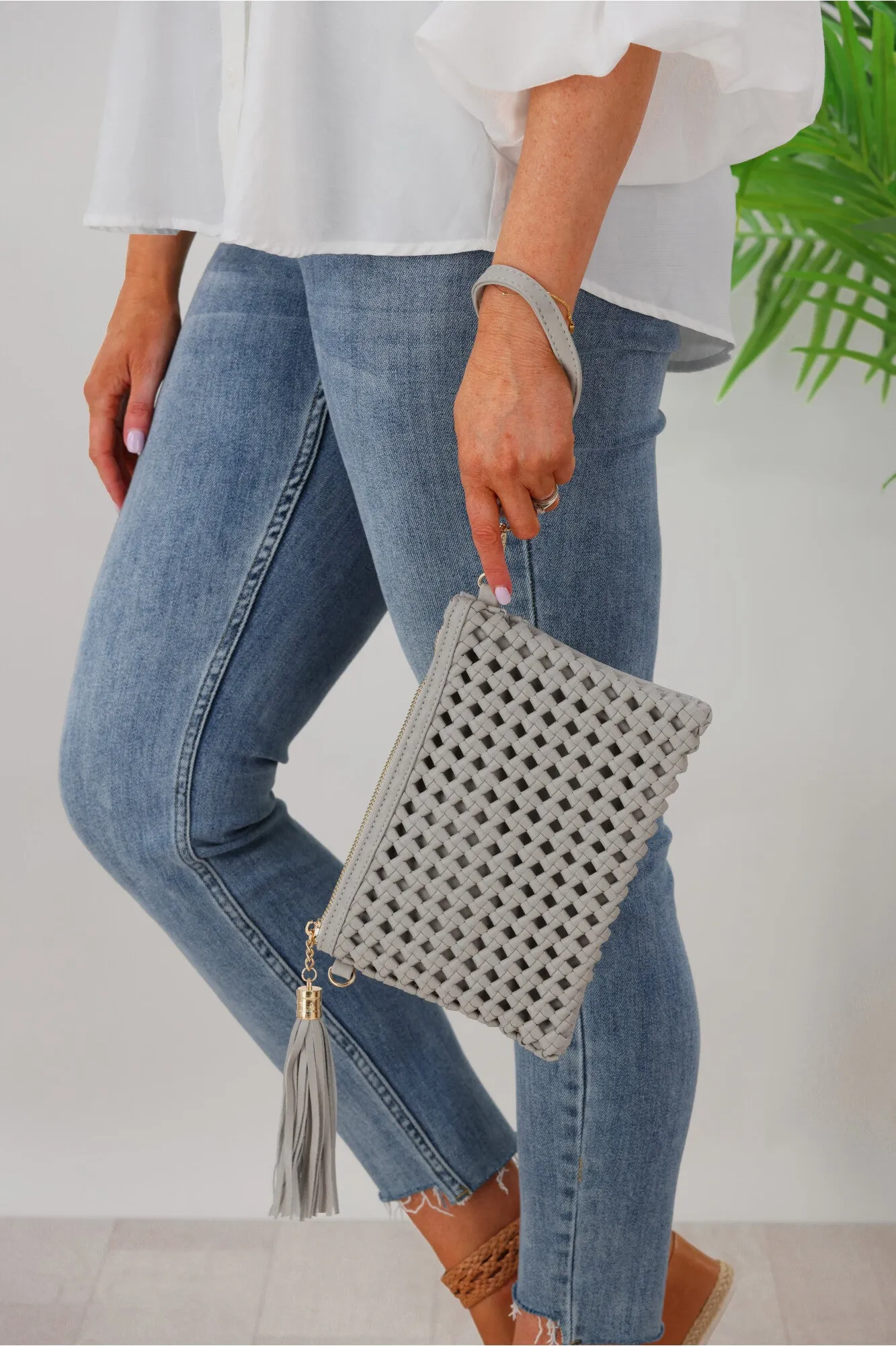 Free Spirit Woven Clutch Bag Stone sold by Shine On